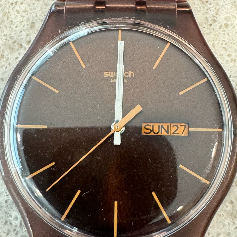 SWATCH watch - brown watch band with brown watch face & gold hour in…